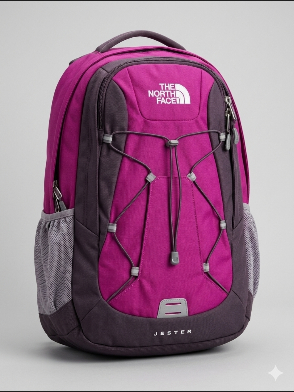 The North Face Jester Backpack in Magenta And Charcoal Grey